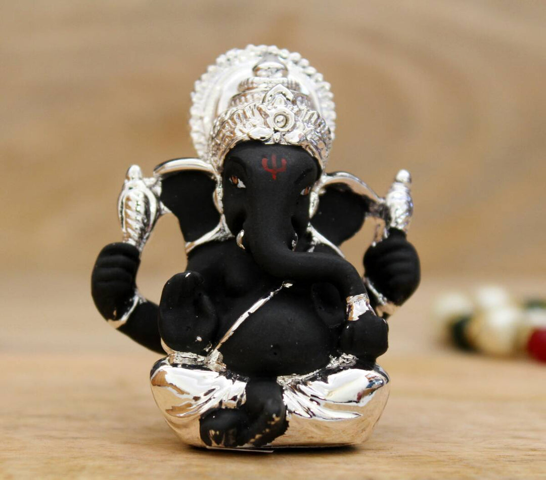 2.5" GANESH SITTING SILVER PLATTING