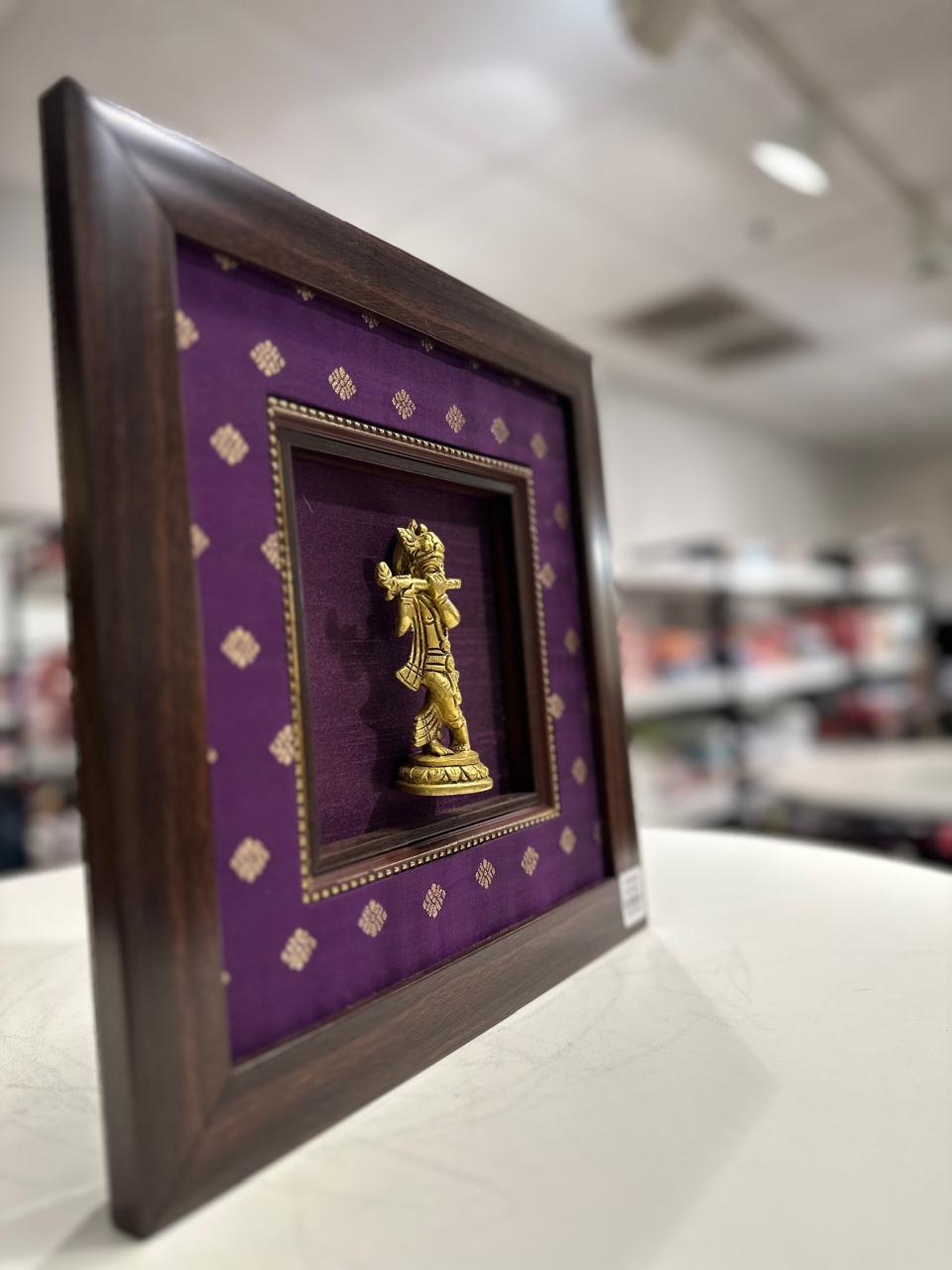 Krishna silk frame with brass idol