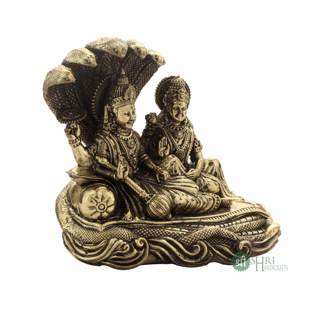 Lord Vishnu & Goddess Lakshmi Seated On Sheshnag Brass Idol 4 Inch By Trendia Decor